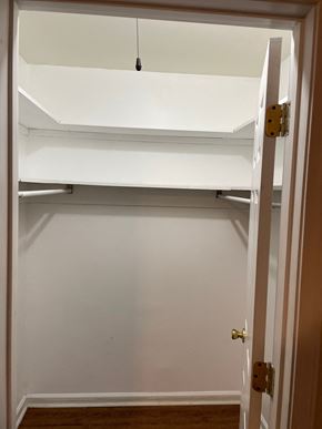 Memphis apartment for rent - A white door with a gold handle and a white wall.