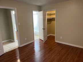 Memphis apartment for rent - A room with wood flooring and white doors.
