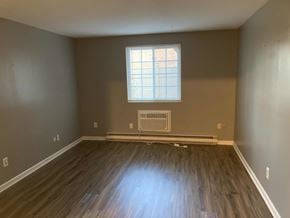 Dayton house for rent - A room with a window and a radiator on the floor.