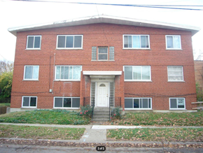 Cincinnati apartment for rent - A red brick house with a white door and windows.