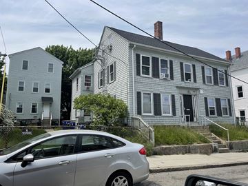 Fall River apartment for rent - a silver car parked in front of a house
