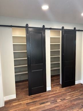 Fairfield house for rent - a room with a closet with a black door