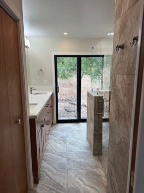 Fairfield house for rent - a bathroom with a shower and a sink and a door