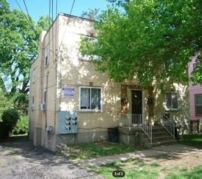 Cincinnati apartment for rent - A building with a tree in front of it.