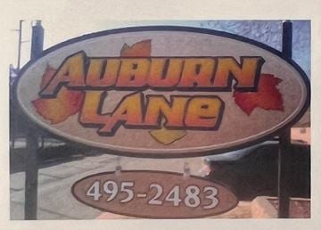 Oklahoma City apartment for rent - A sign that says Auburn Lane with a phone number underneath it.