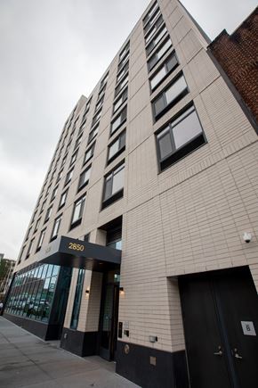 Bronx apartment for rent - A tall building with the number 2850 on the front.