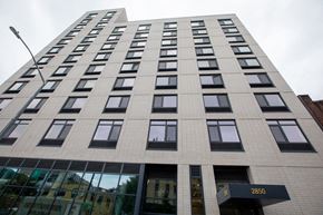 Bronx apartment for rent - A tall building with the number 2850 on the entrance.