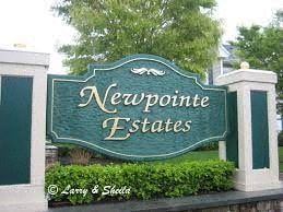 Amityville apartment for rent - a green sign that says estates   in front of a