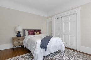 San Francisco apartment for rent - a bedroom with a bed and two closet doors