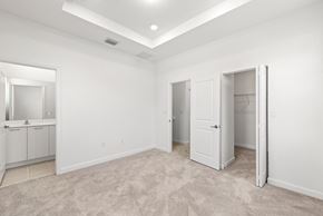 Miami apartment for rent - an empty bedroom with a closet and a bathroom