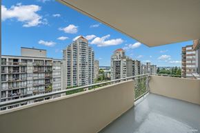 New Westminster apartment for rent - A balcony with a view of apartment buildings.
