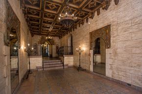 San Francisco apartment for rent - A hallway with a brick floor and a wooden ceiling.