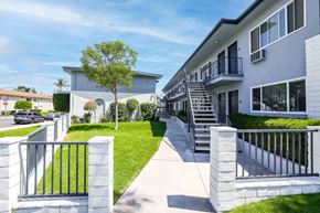 Brea apartment for rent - a house with stairs and a sidewalk in front of it