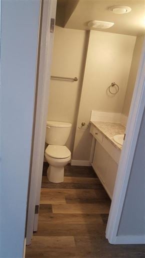 New Westminster apartment for rent - A white toilet is in a small bathroom.