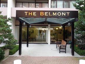 Victoria apartment for rent - The Belmont building has a black awning and a bench outside.