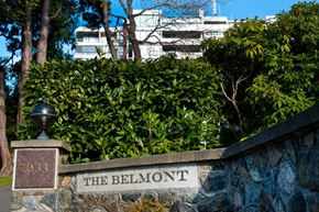 Victoria apartment for rent - A sign that says "The Belmont" is on a stone wall.