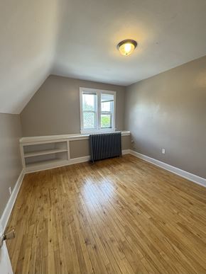 Duluth apartment for rent - A room with wooden flooring and a window.