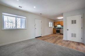 Annapolis apartment for rent - A room with a window, a door, and a kitchenette.