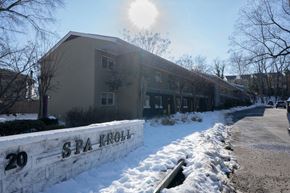 Annapolis apartment for rent - The Spa Kroll building is numbered 20 and has snow on the ground.
