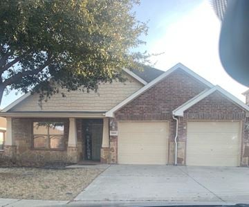 Roanoke house for rent - A house with a brown brick exterior and a black door.