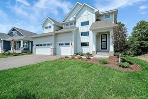 Blaine house for rent - a white house with a driveway and a lawn