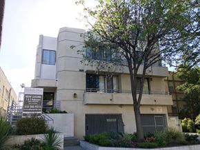 Los Angeles apartment for rent - an apartment building with a tree in front of it