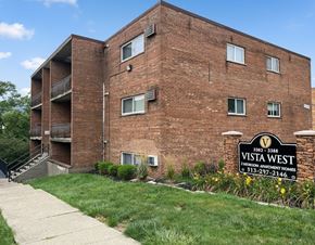 Cincinnati apartment for rent - A brick building with a sign that says Vista West in front of it.