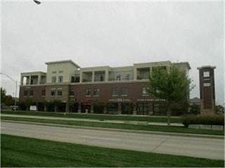 West Des Moines apartment for rent - a large brick building with a clock tower