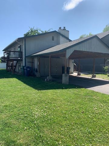 Coeur D Alene apartment for rent - a view of a house with a lawn in front of it