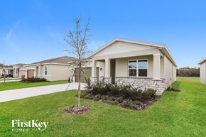 Bartow house for rent - a home with a small tree in the front yard