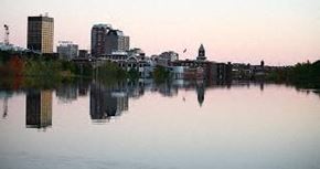 Manchester apartment for rent - a body of water with a city in the background