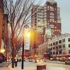 Manchester apartment for rent - a city street with a street light and tall buildings