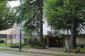 Vancouver apartment for rent - A building with a sign that says 30 on it.
