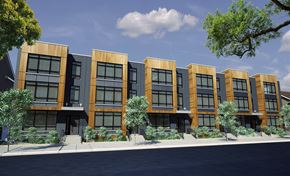 Newark apartment for rent - A row of modern buildings with wooden exteriors and glass windows.