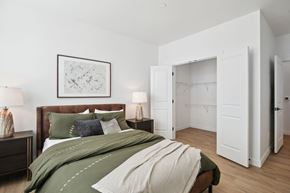 West Jordan apartment for rent - a bedroom with a bed and a closet