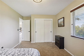 Hudson house for rent - a bedroom with a bed and a closet