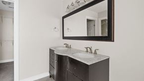 Fayetteville house for rent - a bathroom with a sink and a mirror