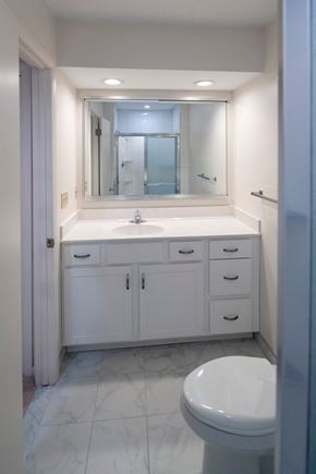 Vestal apartment for rent - a white bathroom with a sink toilet and mirror