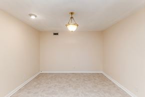Nashville apartment for rent - A room with a light fixture on the ceiling.