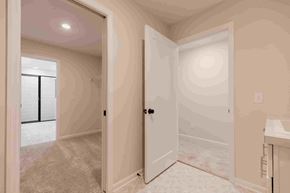 Hugo house for rent - a bedroom with a closet and an open door