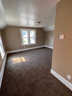 Cleveland apartment for rent - a empty room with carpet and a window