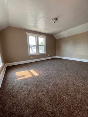 Cleveland apartment for rent - an empty room with carpet and a window
