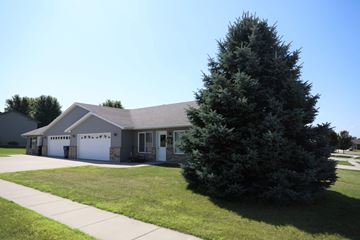 Dell Rapids apartment for rent - a house with a large tree in front of it