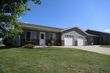 Dell Rapids apartment for rent - a house with a lawn in front of it