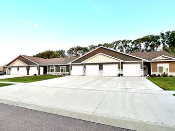 Dell Rapids apartment for rent - a house with a driveway in front of it