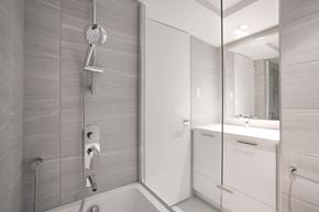 Hampstead apartment for rent - a bathroom with a shower and a sink