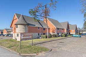 Groves apartment for rent - an image of a building with a sign in front of it