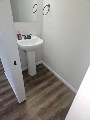 Lima apartment for rent - a small bathroom with a sink and a mirror