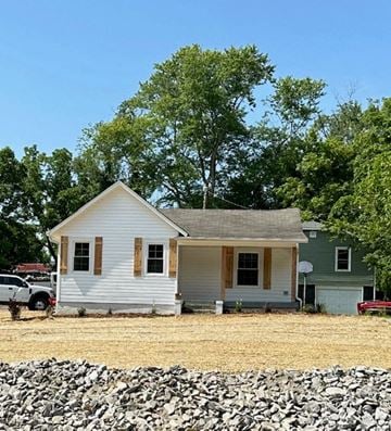Mount Airy house for rent - a small white house with a gravel driveway
