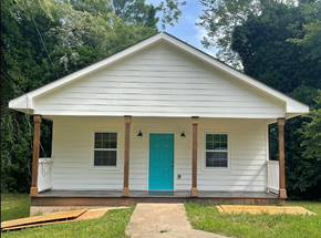 Atlanta house for rent - the front of a white house with a blue door